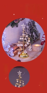 Detail of warm LED Christmas tree lamp with golden spiral frame and crystal pendants