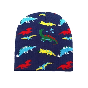 Detail of dark blue knitted beanie featuring colorful jacquard dinosaur patterns for kids