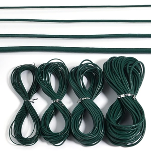Detail of dark green coated iron wire ties in four different diameters for gardening