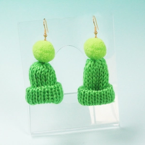 Christmas style green knitted mini hat earrings with soft pompom on acrylic stand