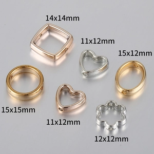 DIY jewelry beads in heart and flower shapes with gold and silver metallic finishes
