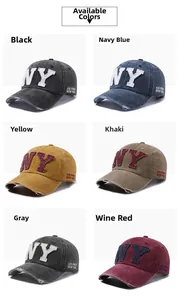 Detailed close-up of six colors of vintage washed cotton baseball caps with NY embroidery