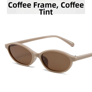 Detail view of oval coffee frame sunglasses with brown lenses and slim temple design