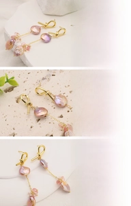 Close-up of baroque freshwater pearl earrings with 18k gold plated knot design