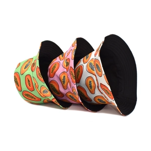 Unisex summer bucket hats with orange papaya print in green, pink and white color options