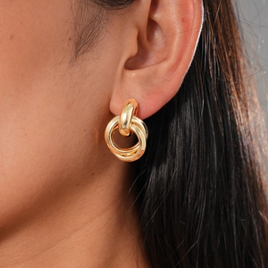 Elegant gold interlocking triple hoop earrings with a high-polished mirror finish for women