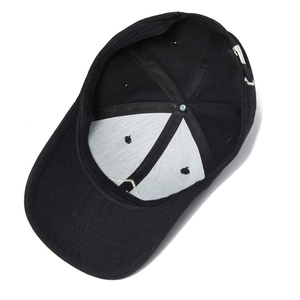 Internal view of black baseball cap with metal adjustment buckle and stitch details