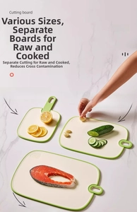 Detailed view of three-piece antibacterial cutting boards with non-slip green edges