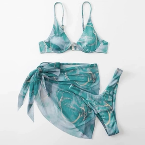 Three-piece marble print bikini set with green swirls and matching wrap sarong