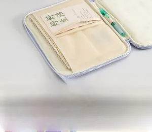 Detail view of the multi-functional inner compartments and mesh pockets of the tablet case