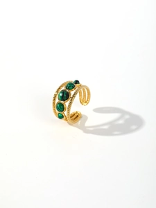 Detail of multi-layer 18k gold plated stainless steel ring with five round malachite stones