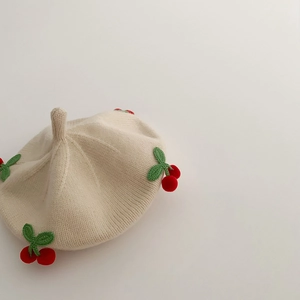 Cute cream-colored baby knit beret hat featuring handmade 3D red cherry decorations