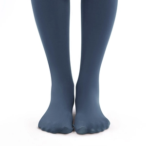 Detail view of matte navy blue thermal fleece-lined leggings in full-foot style