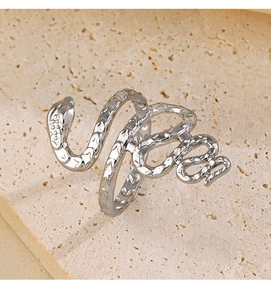 Detailed view of silver snake-shaped open ring with intricate scales and textured finish