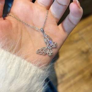 French style silver butterfly necklace with sparkling zircon pavé on a thin chain link