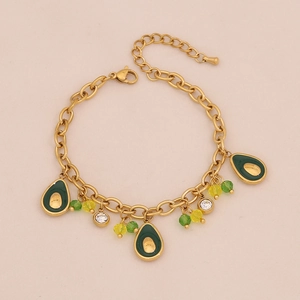 Detail view of gold bracelet with green avocado pendants and colorful crystal beads