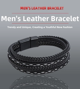 Macro detail of multi-layer braided leather bracelet with black magnetic metal clasp