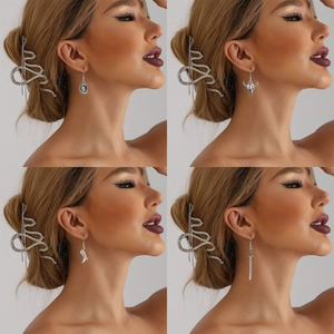 Ensemble de boucles d'oreilles punk western avec bottes de cowboy et têtes de taureau