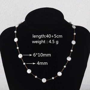 Elegant gold titanium steel pearl necklace with dimensions 40+5cm shown on display