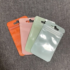 Colorful translucent plastic ziplock bags with hanging holes for packaging small items