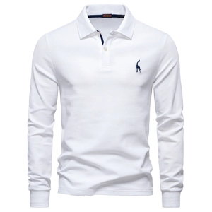 Close-up of white pique cotton polo shirt featuring blue giraffe embroidery and collar detail