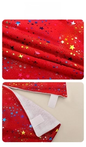Detailed close-up of red sequin Christmas tree skirt with stars and velcro closure