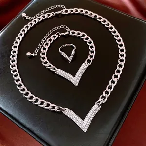 Diamond-set V-pendant jewelry set with silver Cuban chains including necklace and bracelet