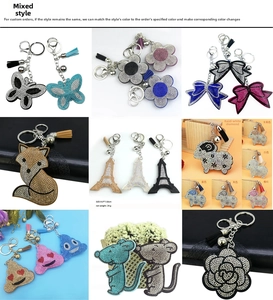 Sparkly rhinestone keychain collection with tassels in butterfly and flower shapes