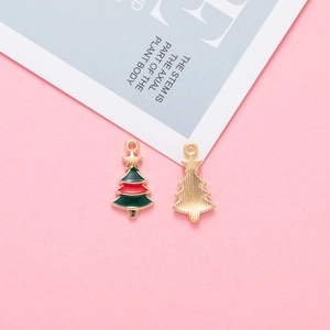 Detailed front and back view of Christmas tree alloy pendants with green and red enamel