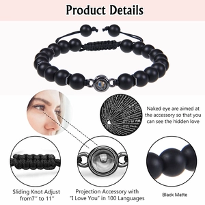 Detail of adjustable matte black stone bracelet with I Love You 100 languages projection