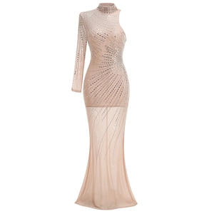 Detail of high neck one shoulder mesh gown with sparkling silver sequins and rhinestones