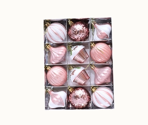 Detail of 12pcs pink and white Christmas ornaments set in transparent box