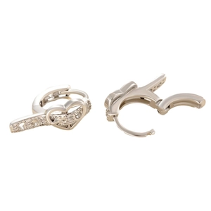 Silver heart-shaped hoop earrings with sparkling cubic zirconia on a white background