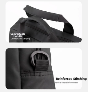 Detail of reinforced fabric handle and durable metal D-ring on black business bag