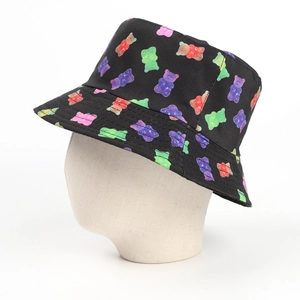 Detailed view of the colorful gummy bear pattern on black cotton canvas bucket hat
