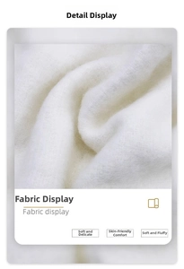 Detail view showing soft, fluffy white mohair fabric texture and premium plush quality