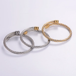 Three-tone elastic stainless steel twisted wire cable bracelets in gold and silver finish