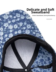 Detail of soft cotton sweatband inside floral denim baseball cap for moisture wicking