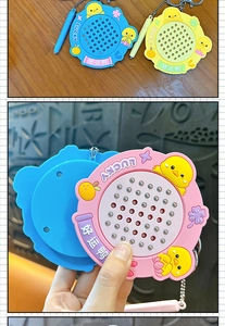 Close-up detail of the pink lucky duck magnetic drawing board keychain with stylus