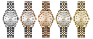 Detail of five luxury quartz watches with steel bands, crystal hour markers and date window