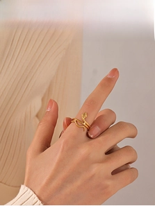 Close-up of 18K gold plated snake ring showing detailed scale texture and wrap design