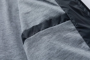 Detailed close-up of lightweight jacket interior with knit lining and ripstop nylon trim