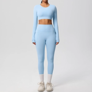 Women's 2-piece light blue yoga set with long sleeve crop top and high waist leggings