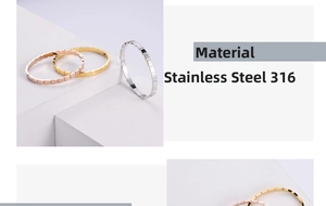Macro detail of geometric cube link bracelet in polished 316 stainless steel finish