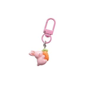 Pink bunny holding carrot keychain with pink metal clasp on a clean white background