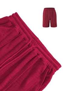 Detail of burgundy waffle knit casual shorts with elastic drawstring waistband