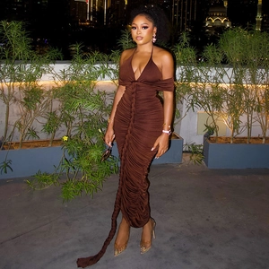 Detail of ruched dark brown halter maxi dress featuring unique thick braided decorative trim