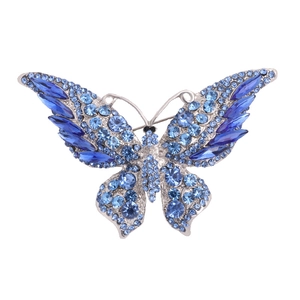 Exquisite butterfly brooch with blue crystals on silver base, elegant fashion accessory