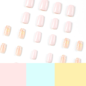 Pink and floral press-on nails with small flowers on a minimalist background