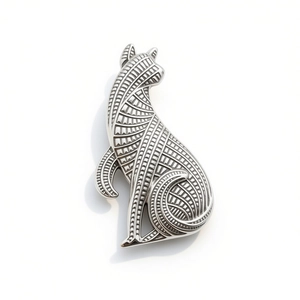 Vintage silver cat brooch with geometric textures and retro oxidized metallic finish